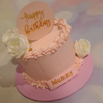 Rose and Piping Celebration Cake